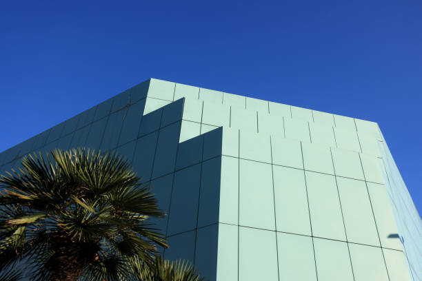 istock Green walls against the blue sky 1823039158