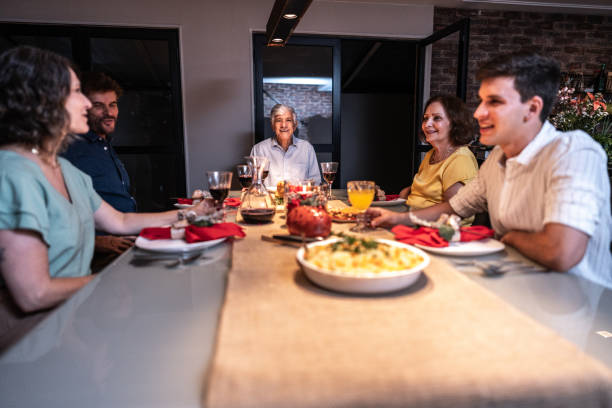 istock Family talking at Christmas dinner 1823040219