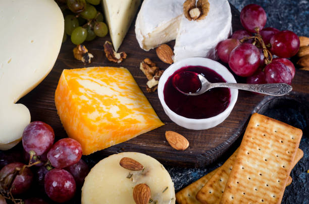 istock Assorted cheese pieces, jam, grapes, cookies and nuts 1823053965