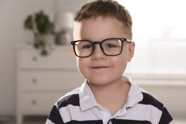 istock Cute little boy in glasses at home 1823069847