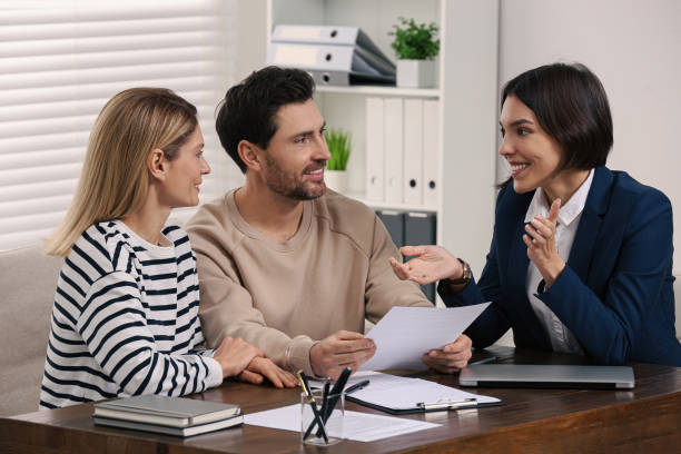 istock Professional notary working with couple in office 1823077374