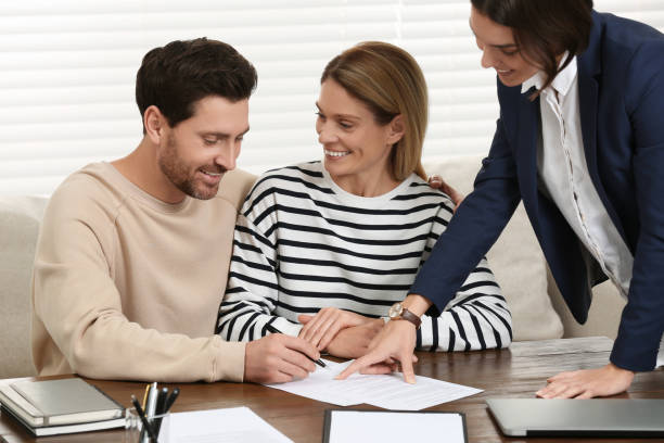 istock Professional notary working with couple in office 1823079486