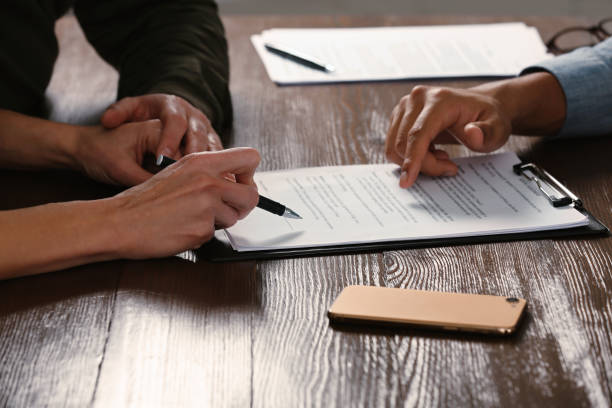 istock Notary working with couple at wooden table, closeup 1823080011