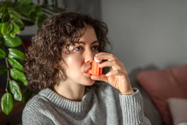 istock Woman with asthma inhaler 1823094445