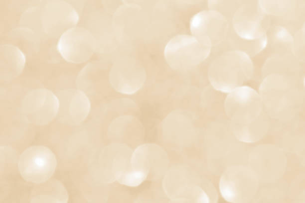 istock Light brown bokeh glitter background. Golden light background. 1823123812