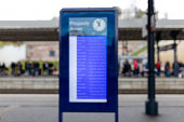 Blurred timetable screen in train station. Airport Terminal: Arrival, Departure Information. Display Showing all the Useful Data For Travelers.