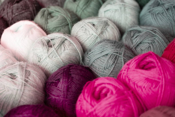 istock Multicolored skeins yarn, wool threads for knitting needles and crochet, for materials on textile arts, hobbies and leisure, creative workshops and themed activities 1823145787