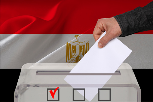 Transparent ballot box for voting with ballot in front Egypt, national flag, Election Process and Democracy, Fair Elections and Anti-Corruption