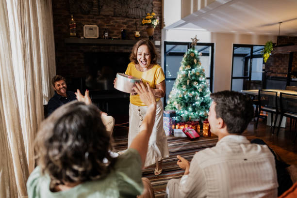 istock Family doing a secret santa during christmas celebration 1823168728