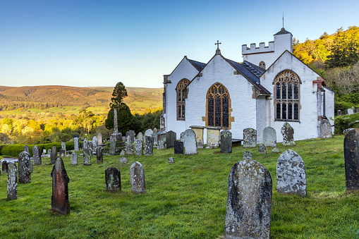 The pretty whitewashed church of All Saints in Selworthy dates back to the 15th century, Exmoor National Park, Somerset.