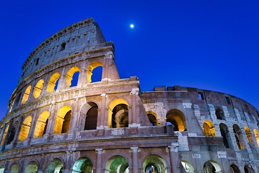 colosseum in rome at night, photo as a background, digital image