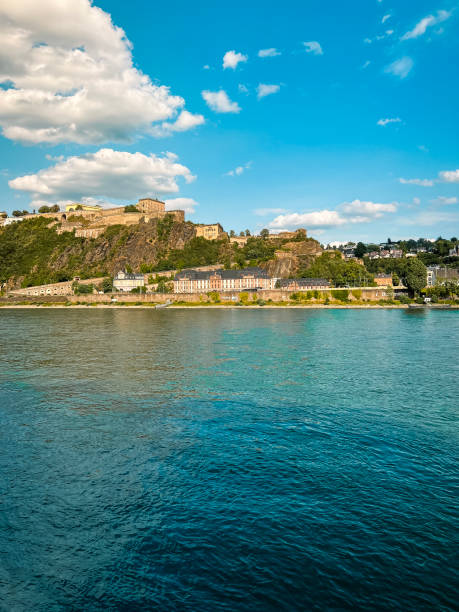 Koblenz, Germany, Europe, July 22, 2023 Traveling along the Rhine River with scenic views of the medieval city of Koblenz, Germany. Majestic views of a medieval architecture on the banks of the Rhine. Koblenz is a German city on the banks of the Rhine and the Moselle, a multinational tributary.