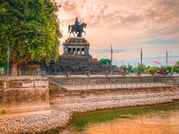 Koblenz, Germany, Europe, July 22, 2023  The Deutsches Eck in Koblenz, Germany - where the Rhine and Moselle Rivers meet. The Kaiser-Wilhelm-Denkmal copper monument was inaugurated by Kaiser Wilhelm I on August 31, 1897.  Views of this statue in Koblenz, Germany from the Rhine River. A UNESCO World Heritage Site.