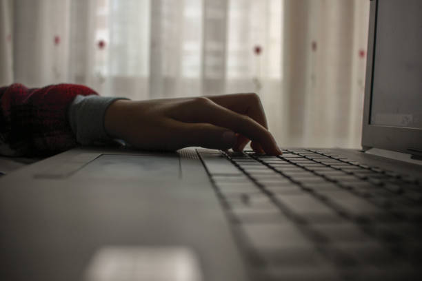 istock hand of a kid surfing the net 1823307008