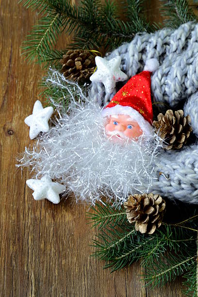 istock Christmas composition with a knitted scarf and decorations 182331356