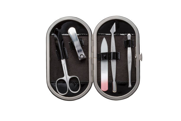 istock Set of steel manicure instruments and tools in black leather case isolated on white background 1823316652