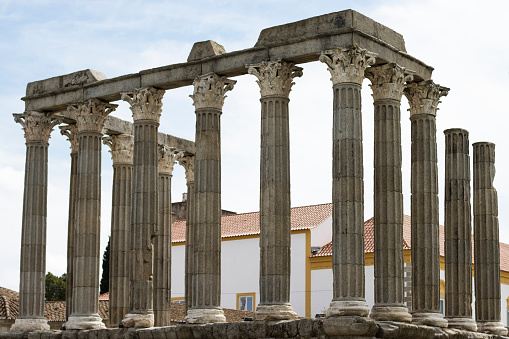 Roman Temple of Diana in Evora on a sunny day in late summer. This temple in Evora was built around the 1st century of the Christian Era in honour of Emperor Augustus. It was only in the 17th century that references to 