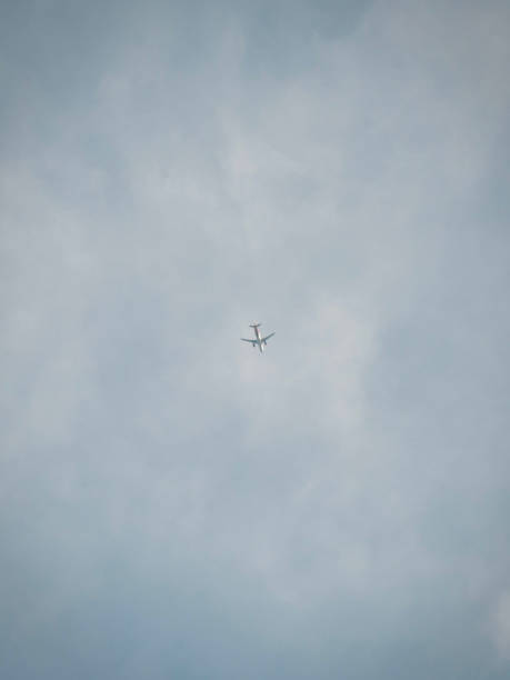 istock The plane looks small and the sky is not very clear 1823408793