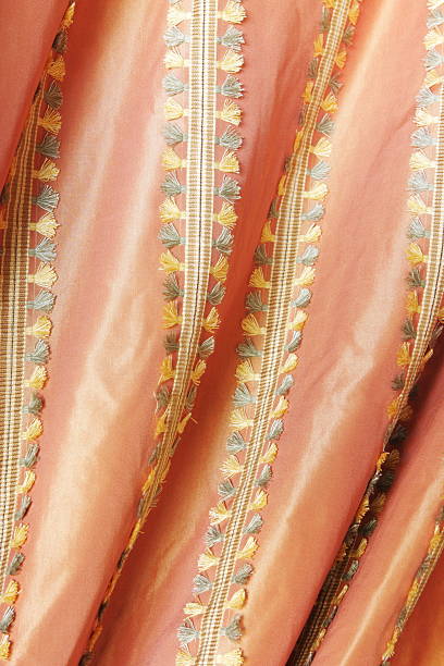 Silk Satin Fabric Fringe Textile Fabric fashion decor with decorative fringe stripes. pink gown stock pictures, royalty-free photos & images