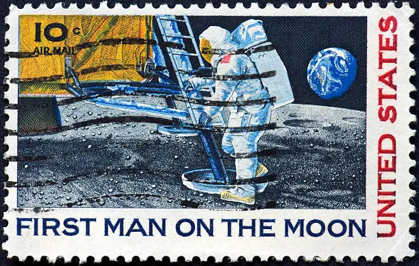 Photo of Vintage First man on the moon stamp, ten cents