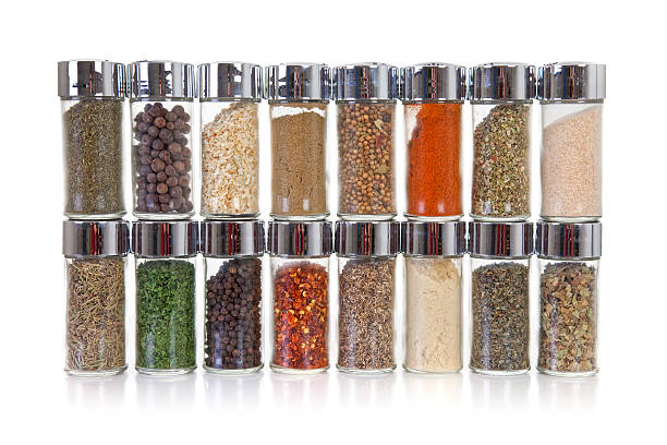 Row of jars with spices Row of jars with spices spice rack stock pictures, royalty-free photos & images