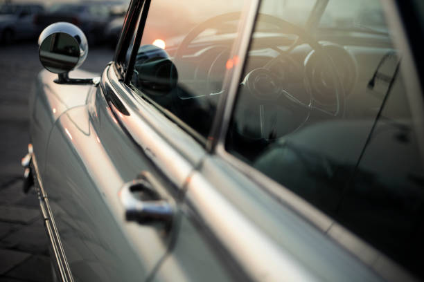 istock A close-up of a retro car at sunset 182350310