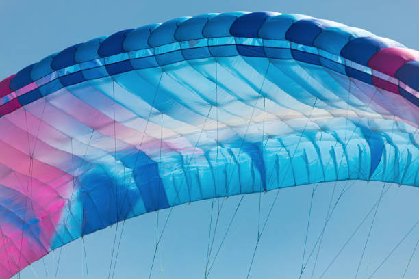 istock Colorful paraglider close-up against the blue sky 1823525321
