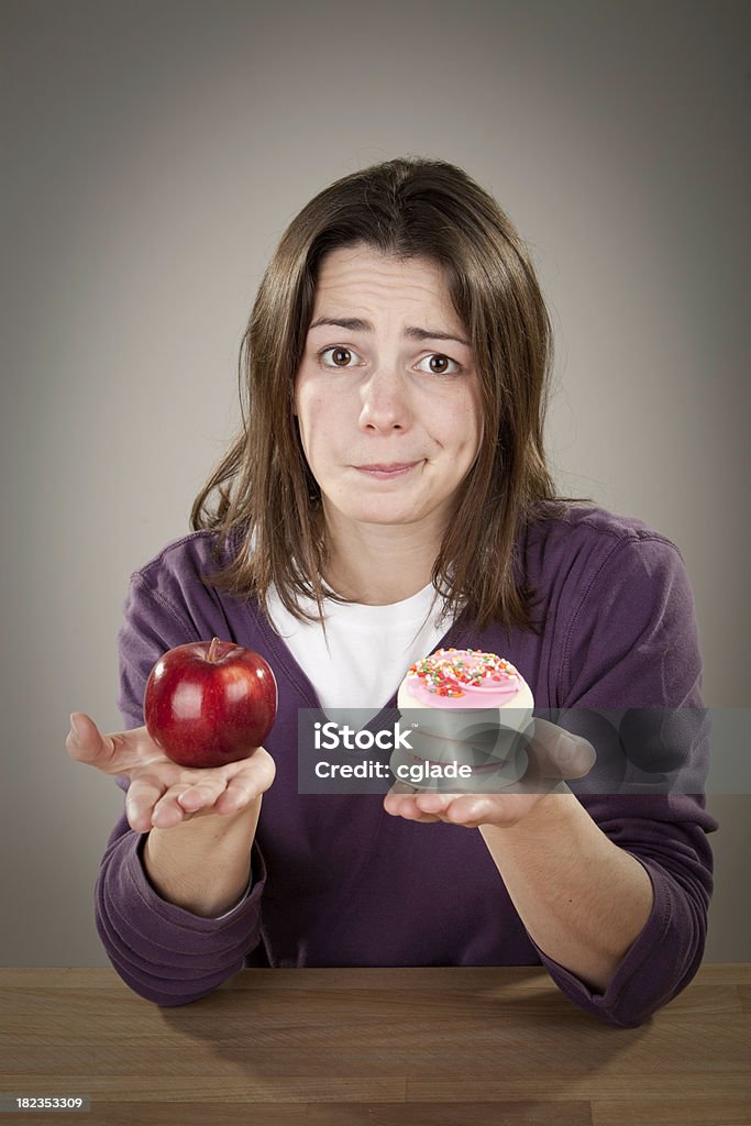 Régimen dilema - Foto de stock de Comida no saludable libre de derechos