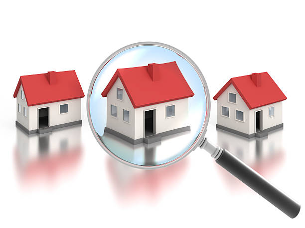 istock Finding a home with magnifying glass - clipping path included 182353417