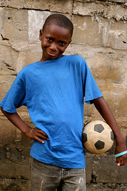 istock African Boy with Soccer Ball 182353523