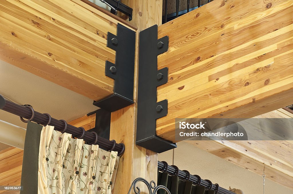 Close up of roof beams This gives a close up of the beams that support the roof and upper level. Bracket - Household Fixture Stock Photo