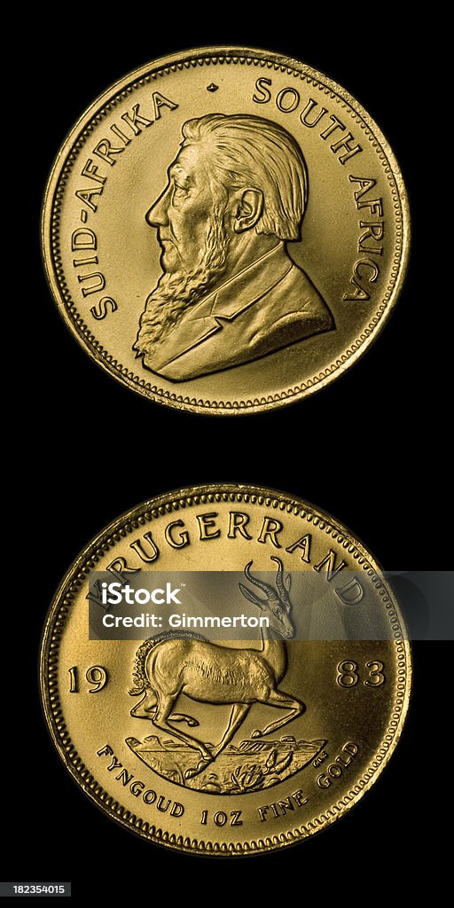 Krugerrand Gold Coin One fine gold ounce Krugerrand coin on isolated black background showing anverse and reverse Krugerrand Stock Photo