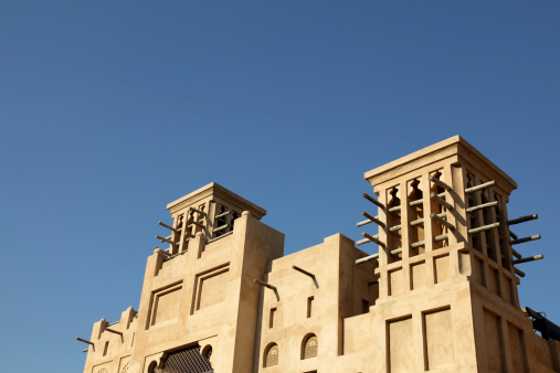 Arabic buildings against blue sky