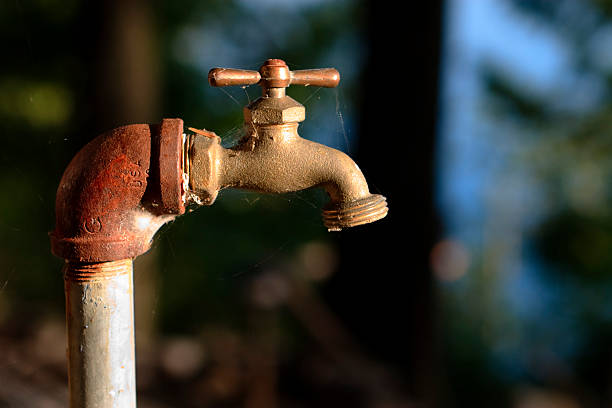 Outdoor faucet stock photo
