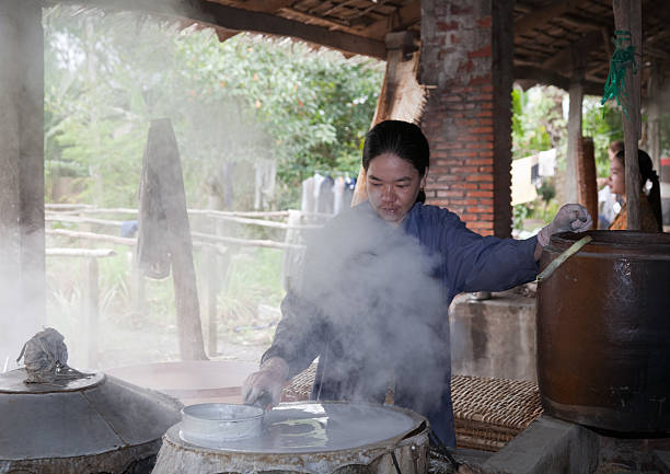 istock Vietnam, making rice paper, near Can Tho. 182354454