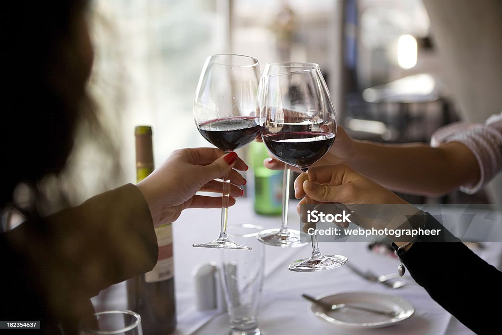 Wine toast "Wine toast, canon 1Ds mark III" Celebratory Toast Stock Photo