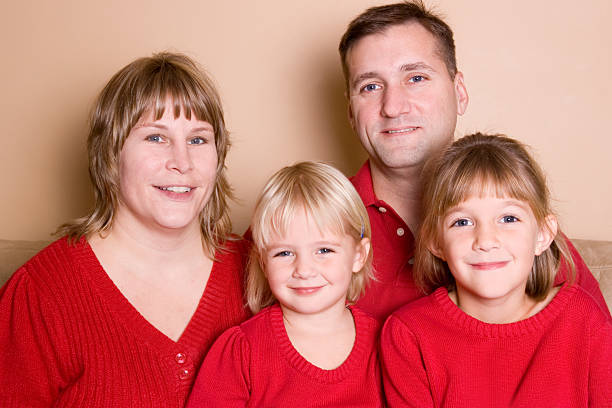 istock Cute family in red 182354934