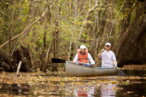 senior people canoeing