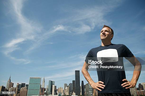 Man In Blank Quote Tshirt Standing In Front Of Skyline Stock Photo - Download Image Now