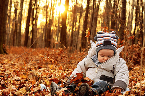 istock Baby and autumn forest 182356579