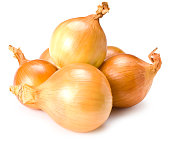 Six gold onions on a white background