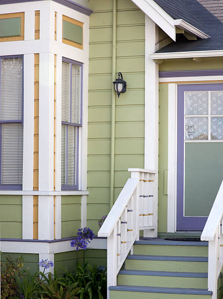istock Cute green victorian house 182356745