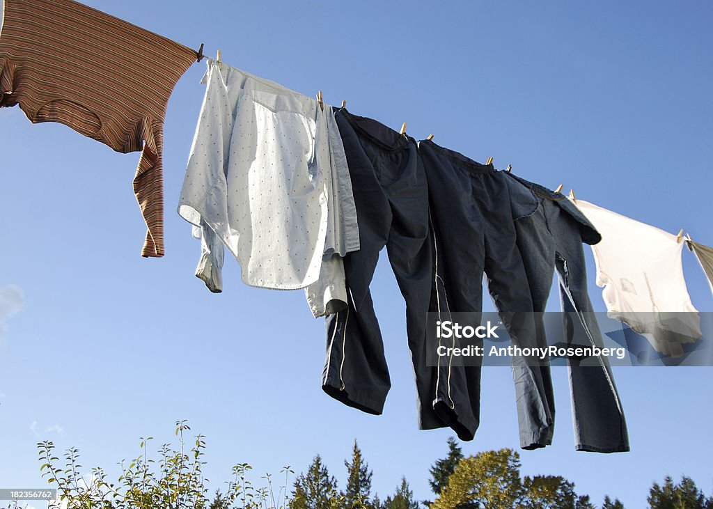 Clothesline with laundry Close up of a clothesline with laundry drying on a sunny day.  See also Below Stock Photo