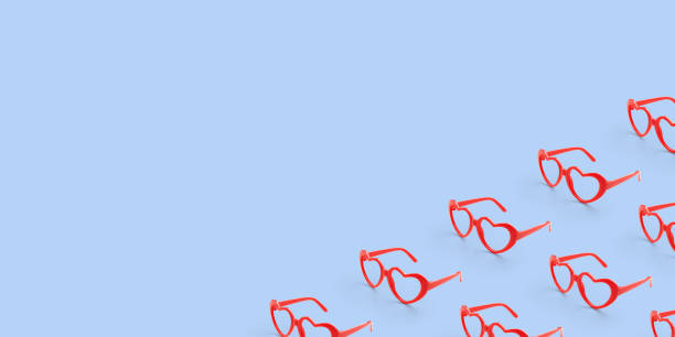 istock Pattern made with red heart shaped sunglasses on pastel color background 1823571160