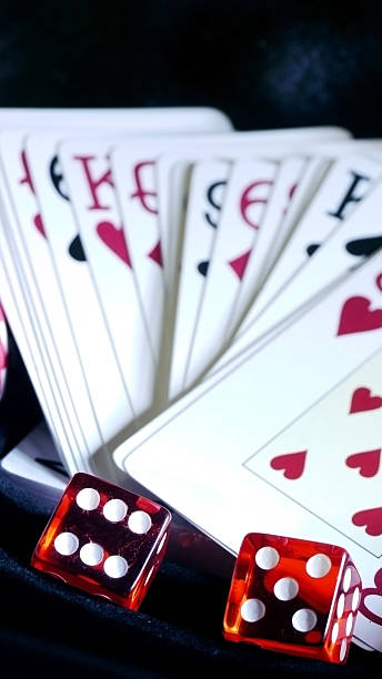 istock Gamble Cards with two dices 182357339