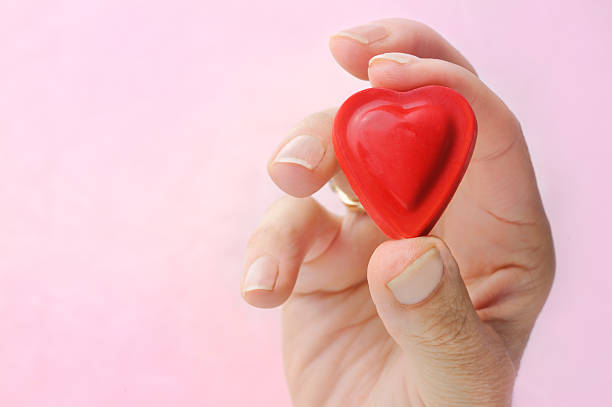istock Heart in your hand 182357815