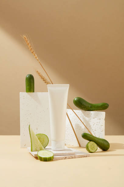 istock The props are arranged on a minimalist background with fresh cucumbers. Home-made cosmetics concept. The image brings a gentle, elegant feeling suitable for cosmetic advertising. 1823590433