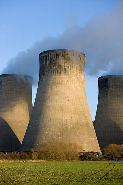 istock Cooling towers at a coal fueled power station. 182359371