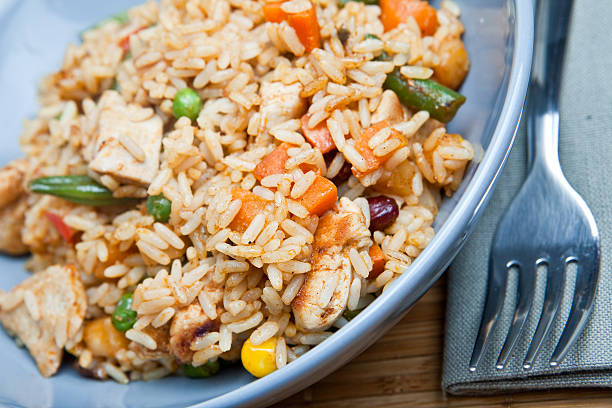 istock Chinese food with rice, vegetables and meat 182360117