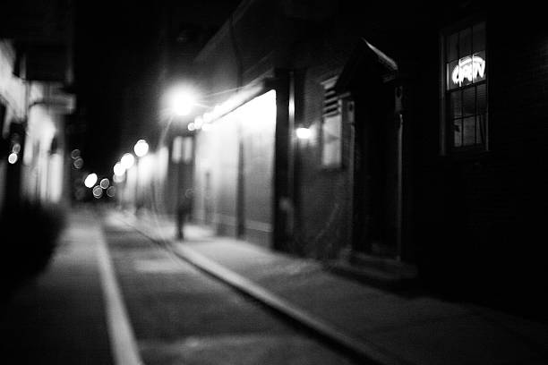 istock city alley at night 182360238